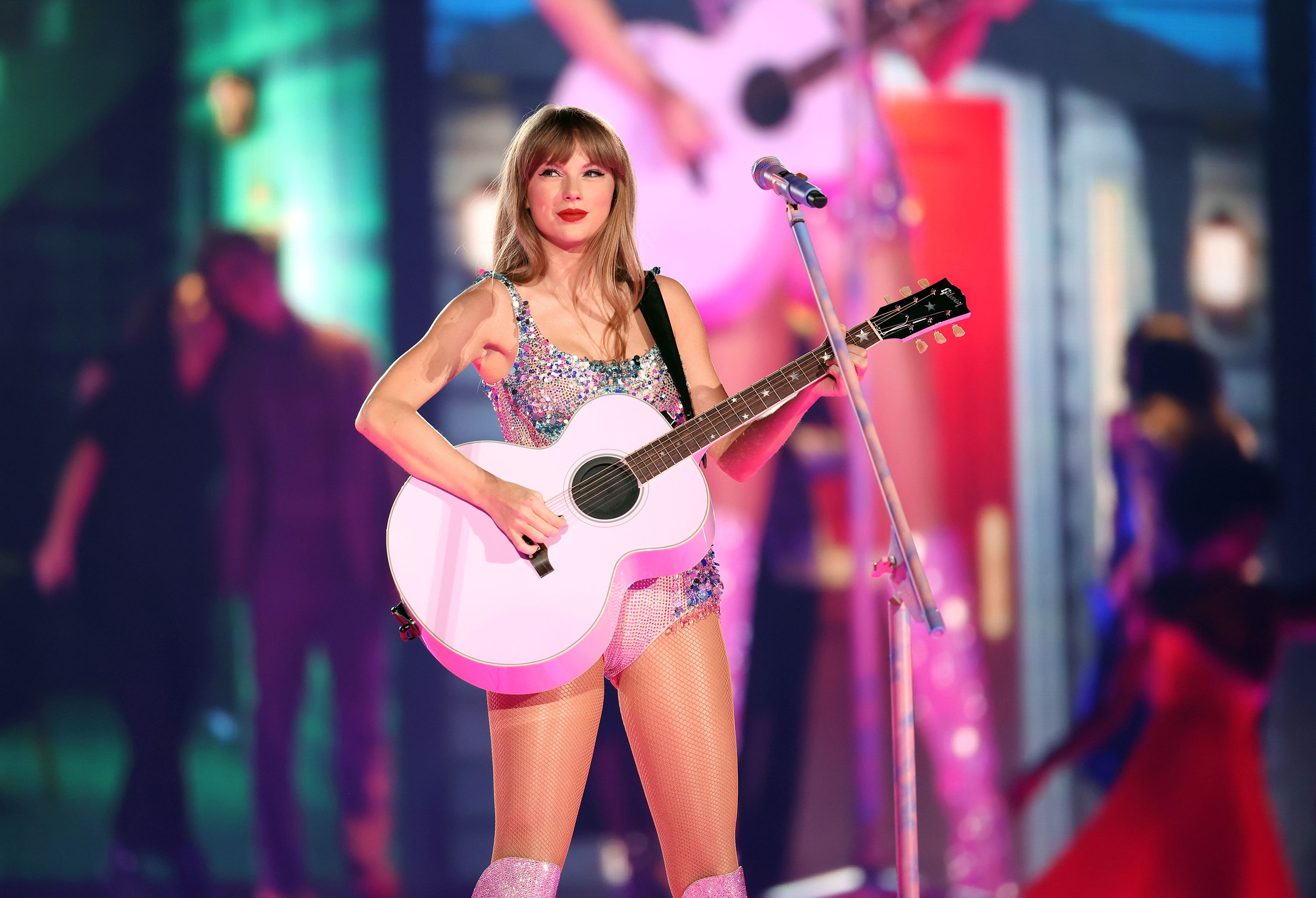 Taylor Swift performing on the Eras Tour opening night in Glendale, AZ